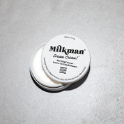 Dream Cream. hair styling cream by Milkman, on grey background